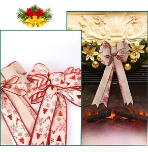 Detail of Christmas tree topper bow with snowflake and reindeer print on burlap fabric