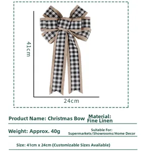 Detailed view of handmade black and white plaid Christmas bow with burlap trim, 41x24cm