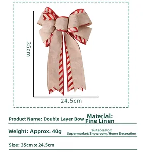 Dettaglio fiocco di Natale in lino 35x24,5cm con bordi a righe bianche e rosse