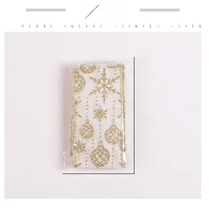 White Christmas ribbon roll with gold glitter snowflakes and 14cm x 8cm size detail