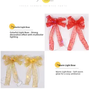 Detail of LED glowing Christmas ribbon bow with snowflake print and warm light battery box