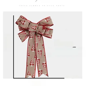 Linen style Christmas bow with red glitter trim and festive tree patterns, 36cm x 22cm size