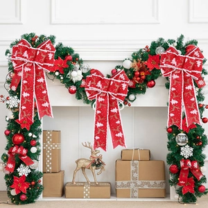 Red Christmas bow set with gold reindeer patterns for holiday tree decoration