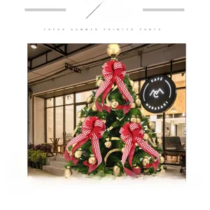 Detail of red and white chevron bow decoration for Christmas tree and festive party scenes