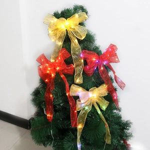 Christmas LED ribbon bow ornaments with snowflake patterns for holiday tree decorations