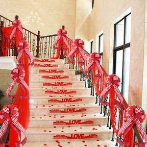 Red and white wave pattern decorative bow for festive staircase and party scene layout