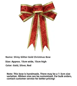 Detail of a 15cm red glitter Christmas bow with gold woven edges for tree decoration