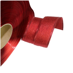Roll of red metallic Christmas ribbon with sparkling wire texture for DIY gift wrapping