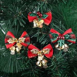 Set of 4 Christmas red bows with gold bells and green leaves for tree decoration