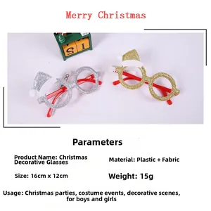 Detailed view of sparkly gold and silver Christmas glasses with red santa hat accents