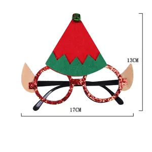 Sparkly red Christmas elf glasses frame with green bell and dimensions 17cm by 13cm