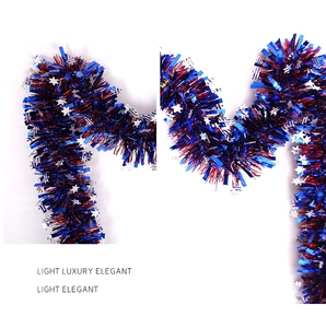 Close-up of red and blue foil tinsel garland with silver star sequins for Independence Day