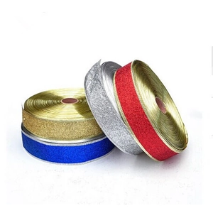 Glitter Christmas ribbons in gold, silver, red, and blue for holiday tree decoration