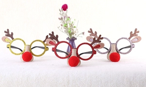 Three-piece glitter reindeer glasses set in gold, red, and silver for Christmas parties
