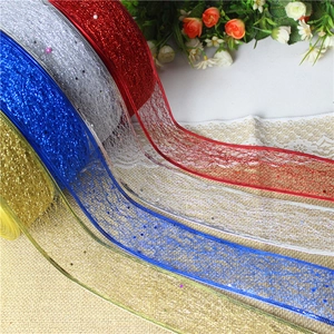 Sparkling Christmas glitter mesh ribbon rolls in red, silver, blue, and gold colors