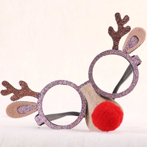 Close-up of reindeer antler Christmas party glasses with pink glitter and red pom-pom nose