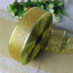 Golden glitter mesh ribbon with metallic luster for Christmas tree decor and DIY crafts