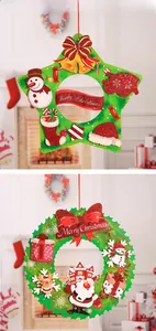 Detail of glittery Merry Christmas hanging ornaments in star and wreath shapes