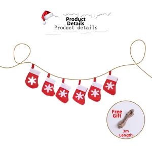 Detail of Christmas banner featuring six red snowflake socks with 3m jute rope hanger