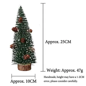 Miniature snowy Christmas tree with pine cones, 25cm height and 10cm width detail view