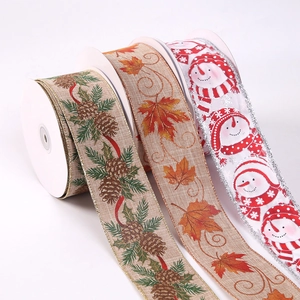 Christmas ribbons with pinecone, maple leaf, and snowman patterns for holiday tree decor