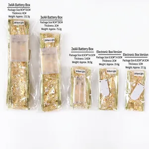 Golden Christmas LED ribbon string lights in various lengths with warm glow effect