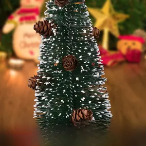 Miniature green Christmas tree with realistic pine cones and white frosted snow details