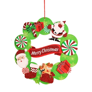 Christmas wreath decoration with glittery Santa, reindeer, and Merry Christmas ribbon