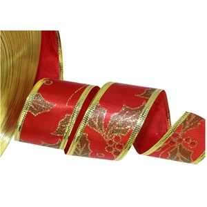 Close-up of 3.8cm Christmas ribbon with holly leaf print and golden wired edges