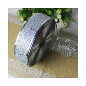 Sparkling silver sequin ribbon roll with metallic edges for Christmas tree decoration