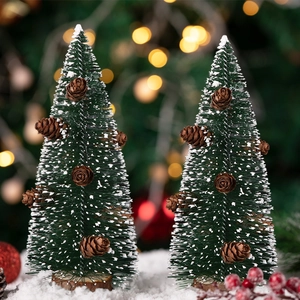 Mini frosted Christmas trees with pinecones and snow on wooden base for desk decor