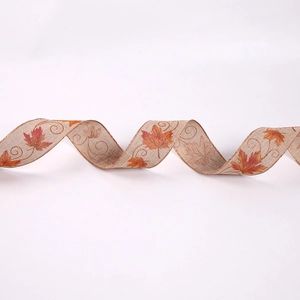 Wired edge autumn ribbon with realistic orange maple leaf patterns for seasonal decor