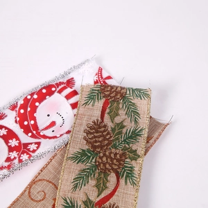 Christmas decorative ribbons with snowman and pinecone patterns and glitter edges