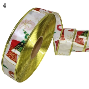 Christmas 3.8cm ribbon in white and gold featuring festive socks and tree prints