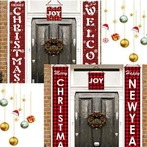 Detail of red buffalo plaid Christmas door banners with hanging rods and festive text