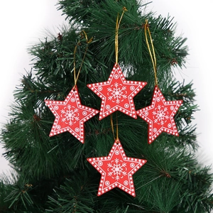 Set of 4 red star Christmas tree ornaments with white snowflake patterns and gold strings