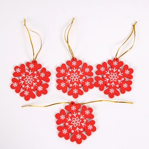 Set of 4 red wooden snowflake Christmas tree ornaments with white patterns and gold strings