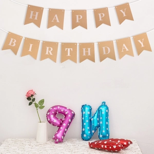 Happy Birthday kraft paper banner with colorful aluminum foil balloons for party decoration