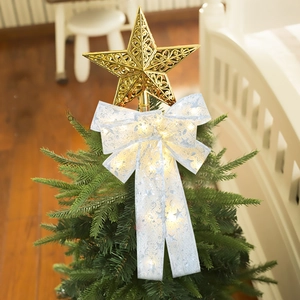 Luminous Christmas tree topper with golden star and warm LED lighted white ribbon bow