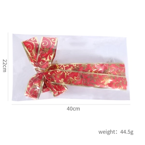 Detail view of red and gold Christmas bow ornament showing dimensions 40cm by 22cm