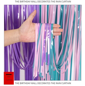 Detail of macaron purple pink and cyan metallic tinsel curtain for party background decoration