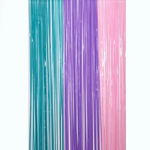 Detail view of macaron colored fringe curtain in teal purple and pink for party backgrounds