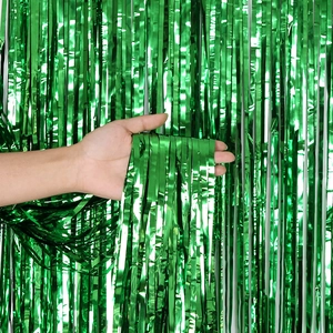 Green St. Patrick's Day fringe curtain with metallic foil reflection for party backdrop