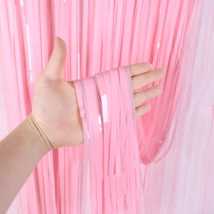 Pink foil fringe curtain backdrop for macaron themed birthday party wall decoration