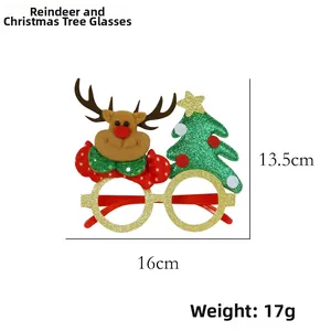 Close-up of festive Christmas glasses featuring elk antlers, Xmas tree, and gold glitter frame