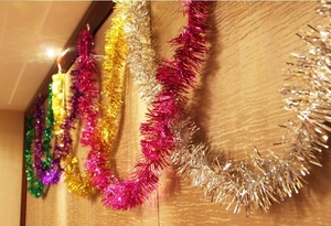 Close-up of 2M colorful shimmering tinsel garlands for Christmas tree and party decor