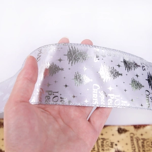 10-meter silver satin Christmas ribbon with glitter holiday greetings and tree patterns