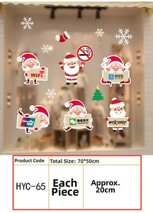 Detail of Christmas window stickers showing Santa with payment icons and snowflakes