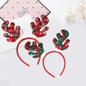 Christmas reindeer antler headbands set in red and green plaid fabric with snow patterns