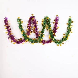 Detail of purple, green, and gold Mardi Gras tinsel garland with shiny heart sequins